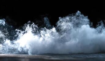 A large wave of water is coming out of the ocean photo