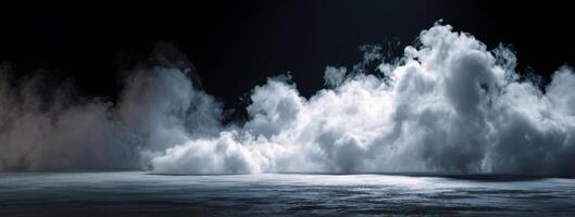 Dramatic Scene of a Dark Night Sky Filled with Ethereal Clouds Casting Soft Reflections on a Glossy Pavement Creating an Atmospheric Ambience photo