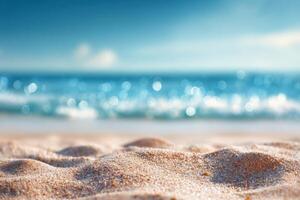 A sandy beach with water and a blue sky photo
