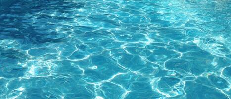 A pool with clear water and blue sky photo