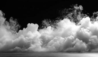 Black and white photo of smoke rising from a fire
