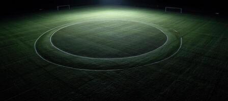 An aerial view of a soccer field at night photo