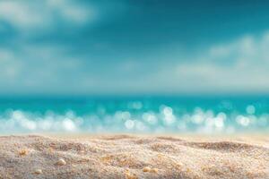 A sandy beach with a blue sky and ocean photo