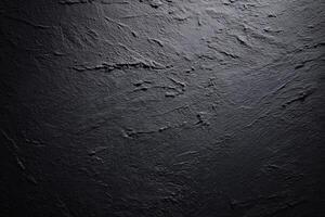 Black concrete wall background with cracks photo