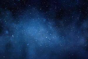 A dark blue sky with stars and a blue background photo
