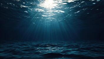 Underwater ocean background with sun rays and sea water photo