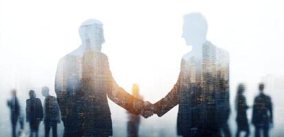 Business people shaking hands in front of city skyline photo