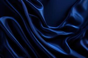 A dark blue satin fabric with folds photo
