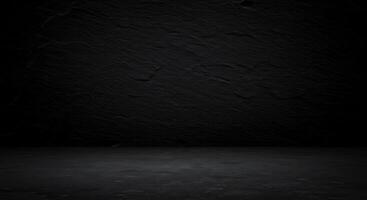 Dark room with concrete floor and black wall photo