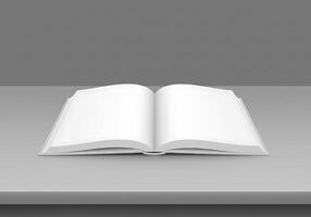 An open book on a table with a gray background photo