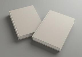 Two blank books on a gray background photo