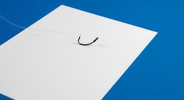 A white piece of paper with a hook attached to it photo