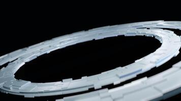 Glowing abstract tech rings with geometric segments in dark futuristic space, 3D render video