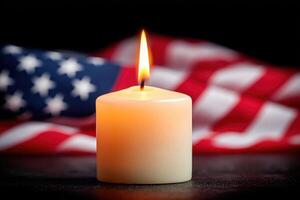 Candle flame illuminates a serene scene with an American flag in the background, symbolizing remembrance and honor during Memorial Day celebrations and tributes photo