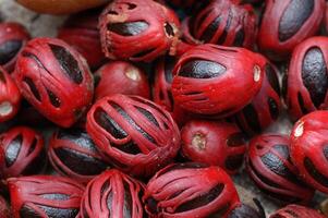 A close up of red and black fruit photo