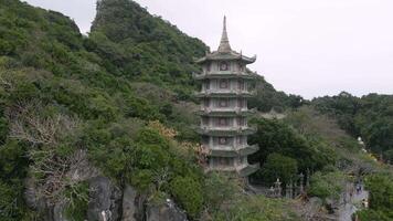 Exploring ancient architecture in lush landscapes at a temple site video