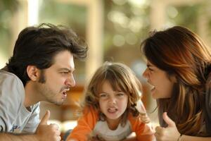 Man and woman shouting at each other with child caught in middle photo