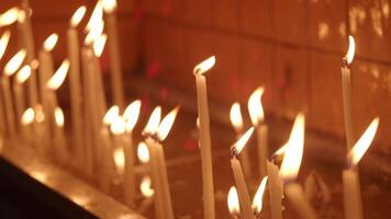 Candles burning in a quiet place for reflection and prayer video