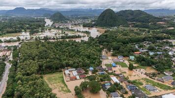 Aerial view of suburb area in Chiang Rai province flooded by Kok river after typhoon Yagi has swept Southeast Asia. photo