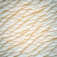 A close up of a white wall with wavy lines photo