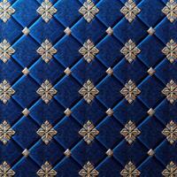 A blue and gold tile background with a gold pattern photo