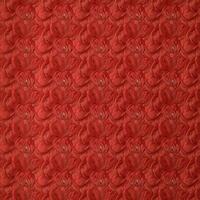 A red fabric with a pattern of flowers photo