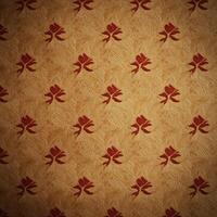 A vintage wallpaper with red flowers on it photo