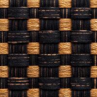 A woven fabric with black and gold stripes photo