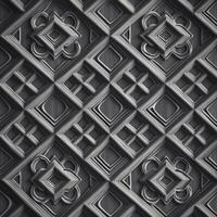 A black and white photo of a wall with decorative patterns