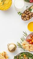 A white table with many different types of food photo