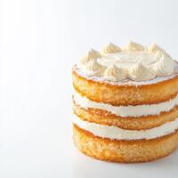 A cake with frosting on top on a white background photo