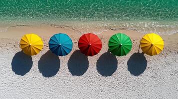 Colorful umbrellas on a beach photo