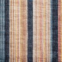 A striped fabric with a blue, yellow and red stripe photo