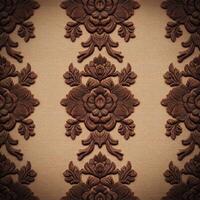 A brown and black wallpaper with a flower pattern photo