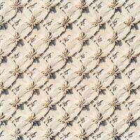 A close up of a wall with a pattern of flowers photo