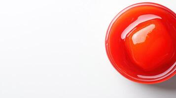 A red bowl with a piece of fruit in it photo