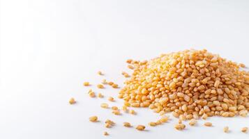 A pile of yellow corn kernels on a white background photo