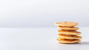 Stack of pancakes on white background photo