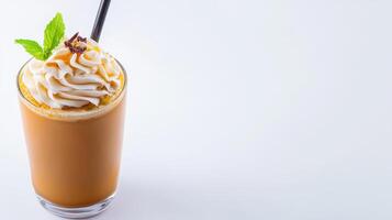 A coffee drink with whipped cream and mint leaves photo