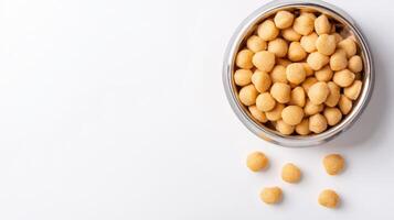 A bowl full of peanuts on a white background photo