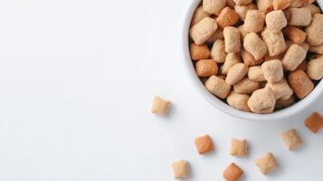 A bowl filled with crackers and other snacks photo