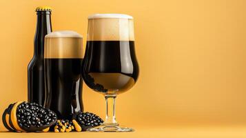 A glass of beer and a bottle of beer next to each other photo