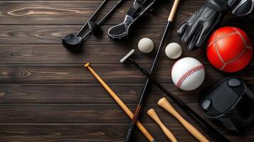 Various sports equipment on a wooden table photo
