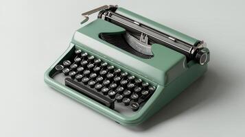 An old green typewriter on a white background photo