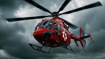 A red helicopter flying through the air photo