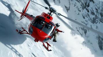 A red helicopter is flying over a snowy mountain photo