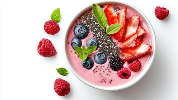 A bowl of smoothie with berries and chia seeds photo
