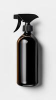 A black spray bottle with a black handle on a white background photo