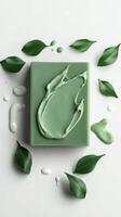 A green soap with leaves on it photo