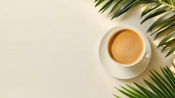 Coffee cup with palm leaves on white background photo